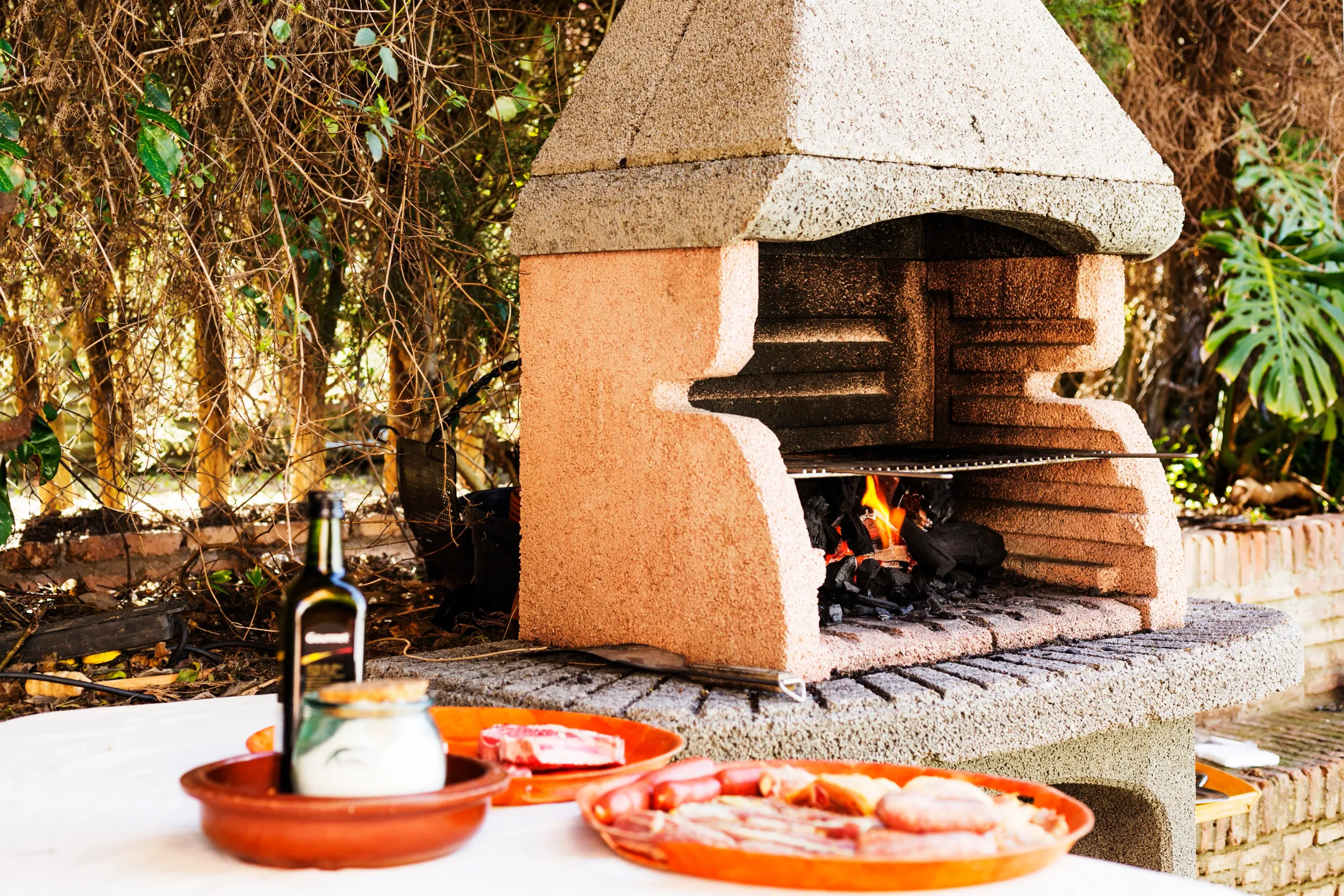 assortment-meat-near-outdoor-barbecue