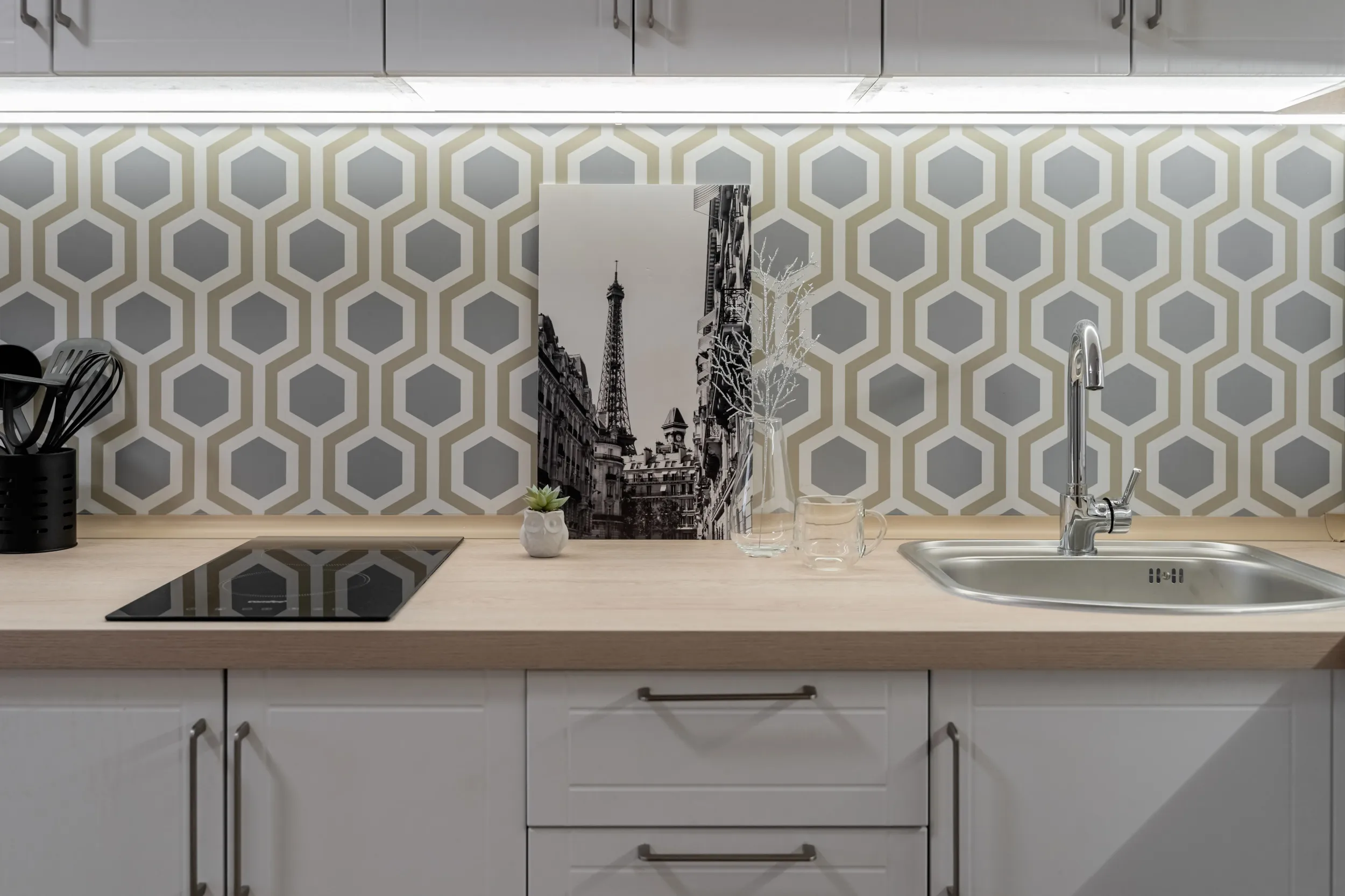 bright-kitchen-with-appliances-sink-stove-decor