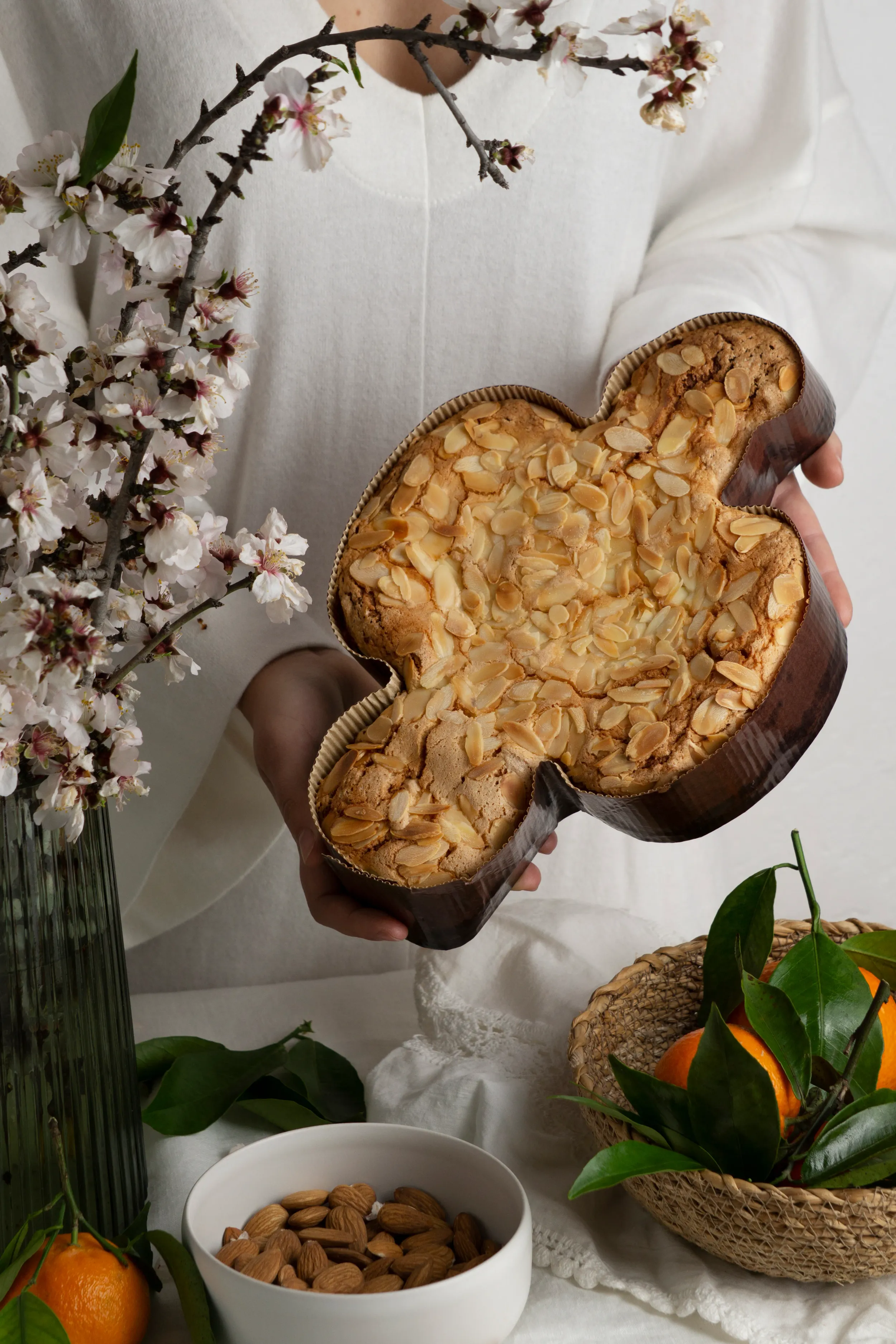 hands-holding-delicious-colomba-high-angle