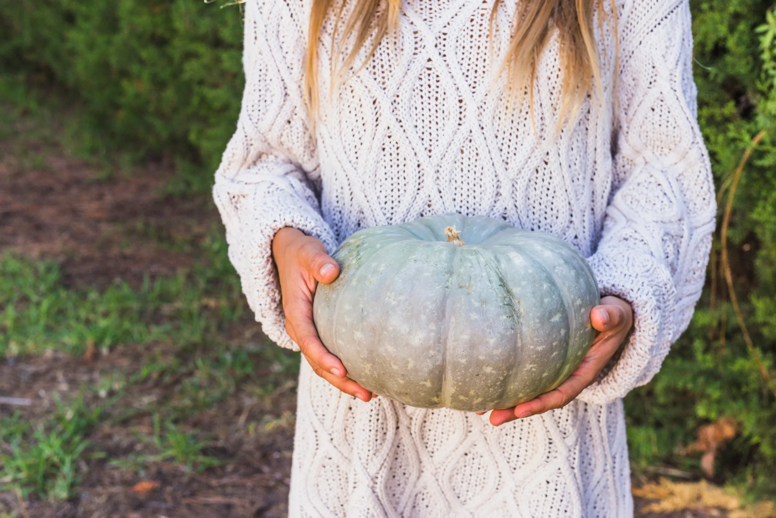 woman-with-big-pumpkin